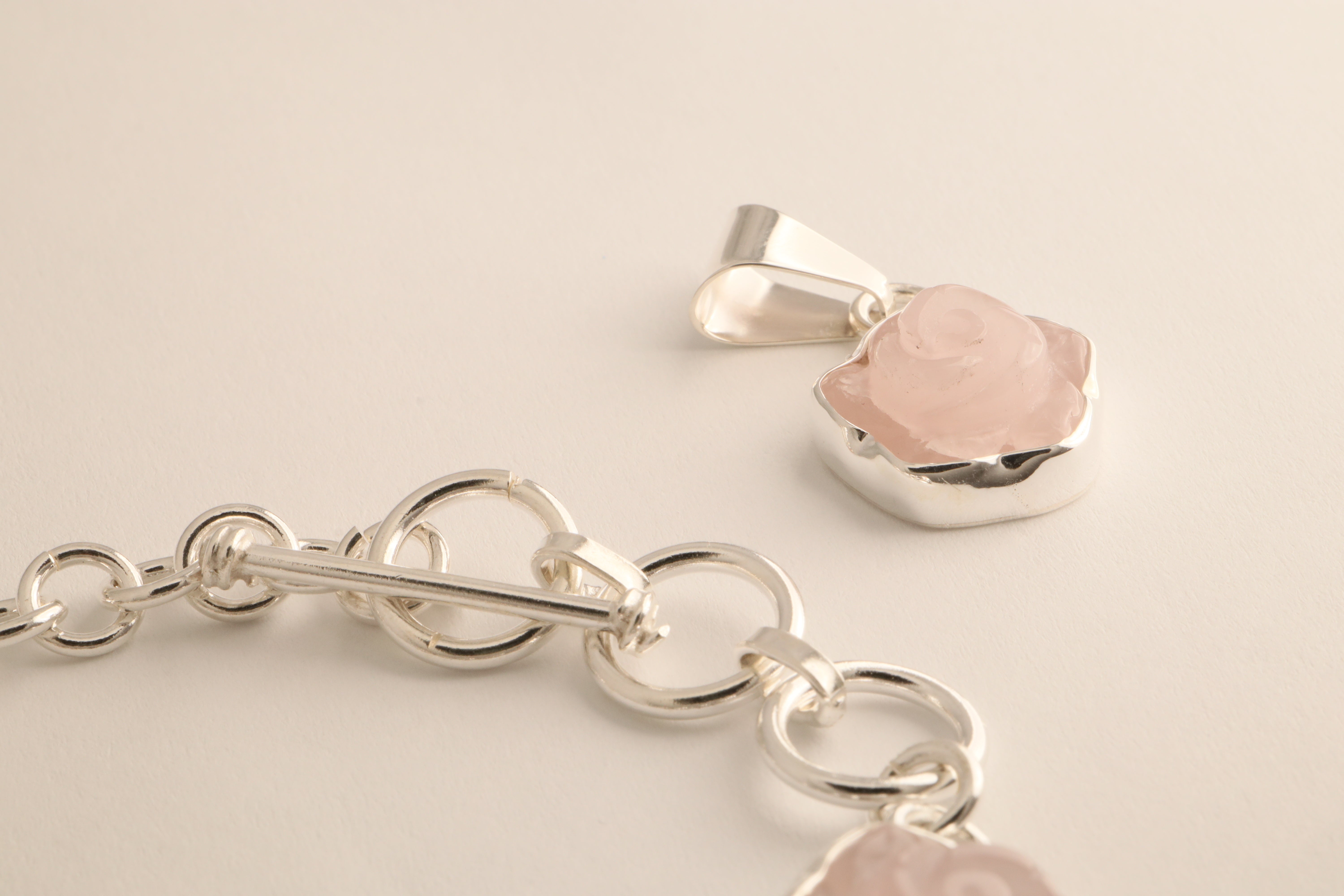 Alma Rosa - Rose Quartz Hand-Carved Rose Jewelry Set (Bracelet, Pendant, and Earrings)